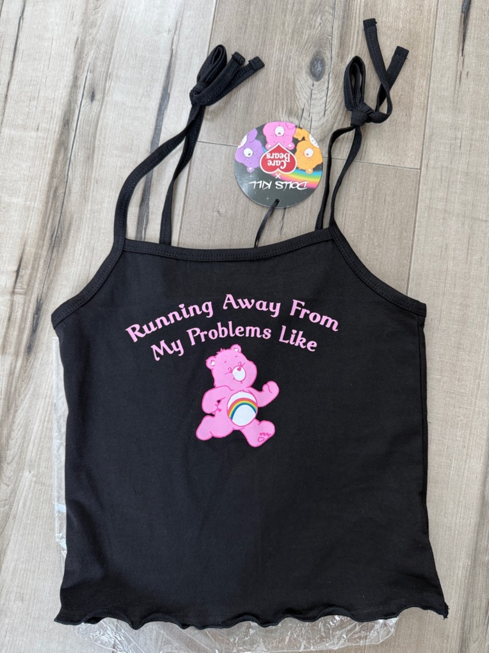 Dolls Kill Black Tie-Shoulder Tank with Pink Bear Graphic